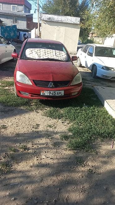 Mitsubishi Lancer: 2003 г., Седан