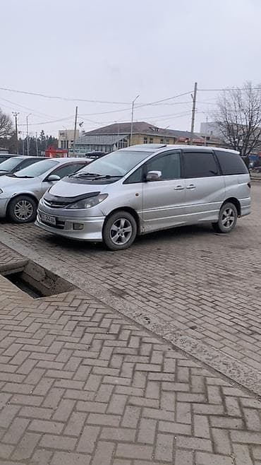 Микроавтобус/минивэн серебристого цвета.Тайота Эстима 2.4 Основные