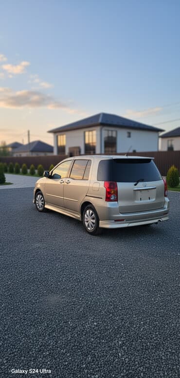 шины разноширокие: Mini : 2003 г., 1.5 л, Автомат, Бензиновая, Минивэн — 1