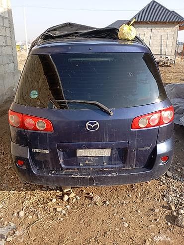 Продажа авто: Mazda Demio: 2006 г., Механика, Бензин, Хэтчбэк — 6
