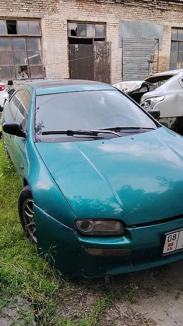 Mazda 323: 1999 г., 1.6 л, Механика, Бензин, Седан