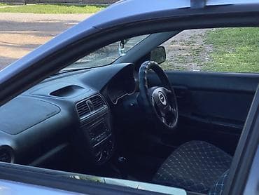 что за машина: Subaru Impreza: 2004 г., 1.5 л, Автомат, Газ, Седан — 4