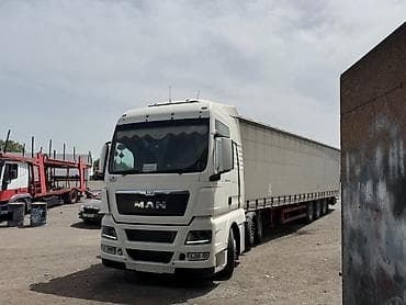 юуто трактор: Тягач, MAN, 2013 г., Тентованный — 2