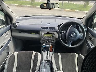 авто из кареи: Mazda Demio: 2003 г., 1.3 л, Автомат, Бензин, Хэтчбэк — 5