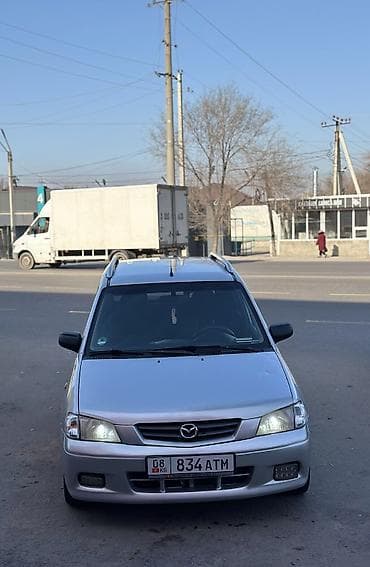 step vagon: Mazda Demio: 2003 г., 1.3 л, Ручные, Бензин, Универсал — 7