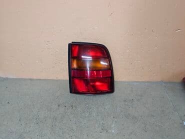 Задний левый стоп-сигнал Nissan 1996 г., Б/у, Оригинал, Германия