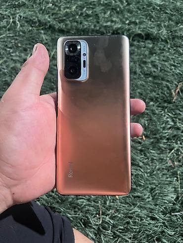 Смартфон Redmi (серия Note) в градиентном медном цвете. Основные — 2