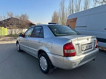 продаю автомобили: Mazda 323: 2002 г., 1.6 л, Механика, Бензин, Седан — 3