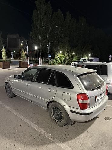 mazda f323: Mazda Familia: 2002 г., 1.5 л, Механика, Бензин, Универсал — 4