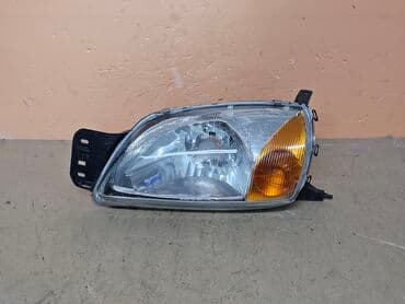 автозапчасти для форд фокус 2: Передняя левая фара Ford 2000 г., Б/у — 1