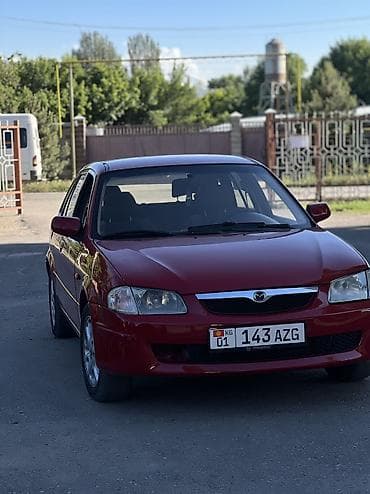 ваз 2112: Mazda 323: 1998 г., 1.5 л, Механика, Бензин, Хэтчбэк — 2
