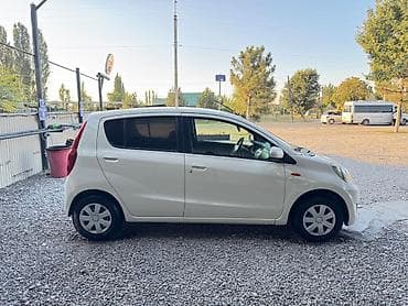 byd e1: Daihatsu Cuore: 2009 г., 1 л, Автомат, Бензин, Хэтчбэк — 3