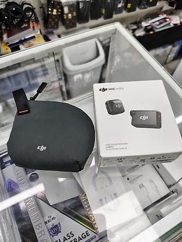 микрофоном: DJI Mic Mini — компактная беспроводная микрофонная система для съёмки — 1