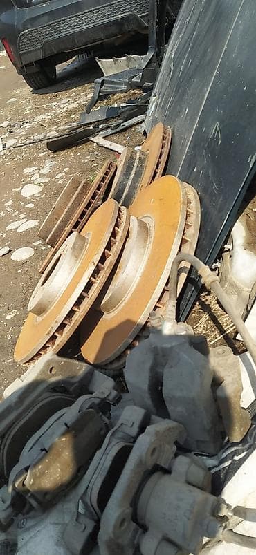 Автохимия: БМВ Е53 тормозные диски с суппортами и колодками. Тормозной комплект — 5