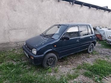 кассеты аудио: Daihatsu Cuore: 1993 г., 1.1 л, Механика, Бензин, Хэтчбэк — 1