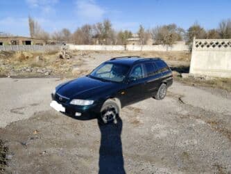 диски железные r14: Mazda 626: 2002 г., 2 л, Механика, Бензин, Универсал — 2