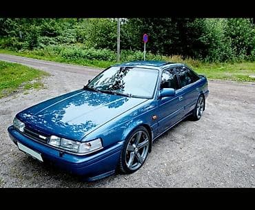 Купе/седан 2‑дверный, с классическим угловатым дизайном конца 80‑х –то