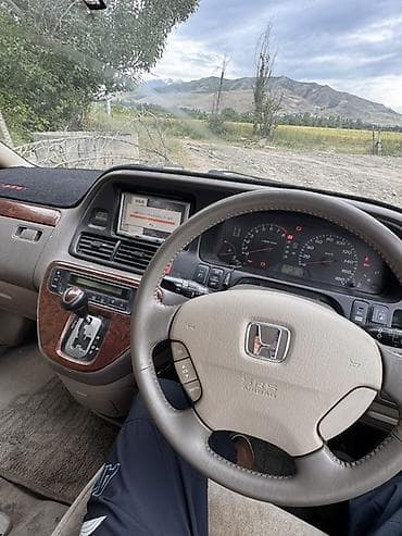 двойной выхлоп: Honda Odyssey: 2001 г., 2.3 л, Автомат, Газ, Минивэн — 4