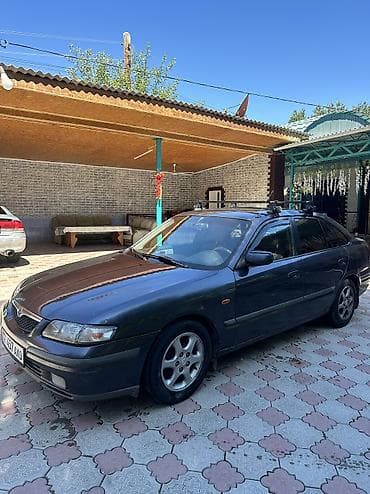 Унаа сатуу: Mazda 626: 1999 г., 1.8 л, Кол менен иштөөчү, Бензин, Седан — 2