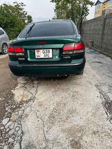 kia stringer: Mazda 626: 1998 г., 2 л, Автомат, Бензин, Седан — 1