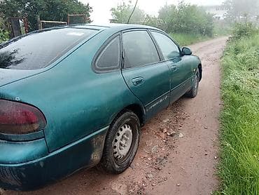 капот солярис: Mazda 626: 1992 г., Седан — 1
