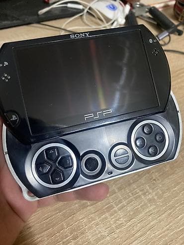 psp 5: Портативная консоль Sony PSP Go (PSP-N1000) - Форм‑фактор слайдер — 1