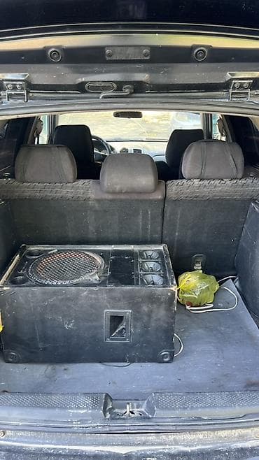 mini copper: Mazda 323: 2001 г., Универсал — 7