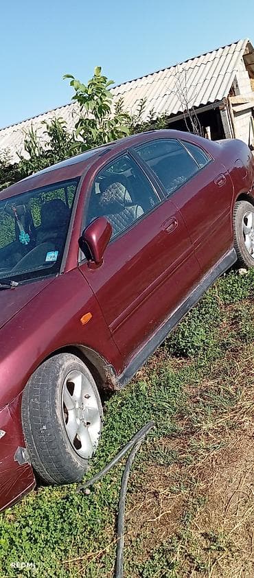 Mitsubishi Carisma: 1999 г., Бензин — 1