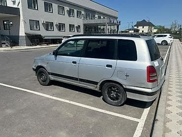 на дайхатсу: Daihatsu Pyzar: 1999 г., 1.5 л, Механика, Бензин, Хэтчбэк — 4