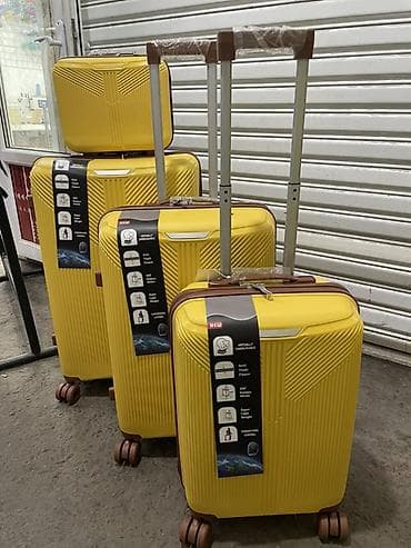 советский чемодан: Набор чемоданов на 4 колёсах + дорожная косметичка - Жёсткие чемоданы — 2