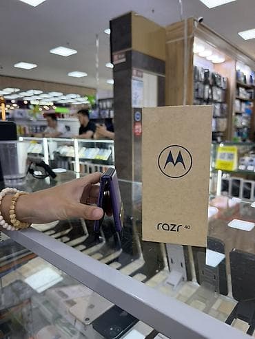 телео: Motorola Razr 40, Новый, 256 ГБ, цвет - Фиолетовый, 2 SIM — 4