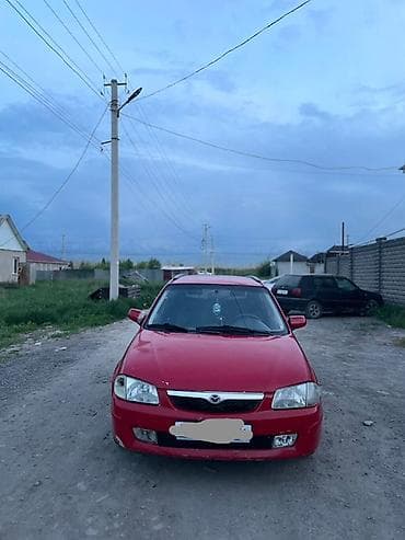 Mazda Familia: 1999 г., 1.5 л, Механика, Бензин, Универсал