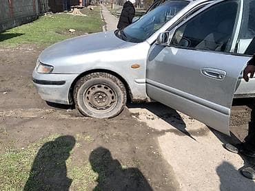 Mazda: Mazda 323: 1999 г., 1.8 л, Бензин, Универсал — 1