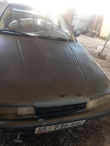 Mazda 626: 1989 г., 2 л, Бензин, Седан — 4