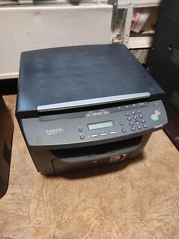 сканеры до 1200: Многофункциональное устройство Canon i-SENSYS MF4018. Это устройство — 2
