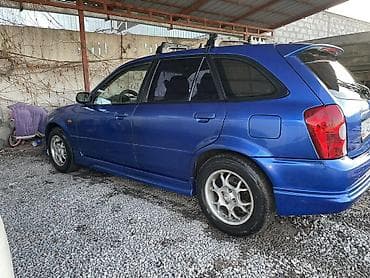 toyta vitz: Mazda 323: 2002 г., 1.6 л, Механика, Бензин, Хэтчбэк — 5