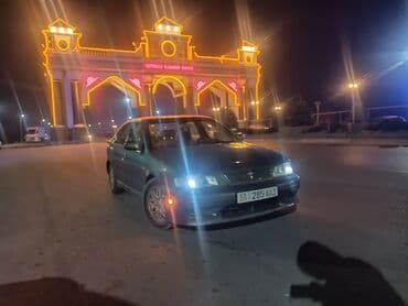 значок на авто: Nissan Primera: 2000 г., 2 л, Автомат, Бензиновая, Седан — 1