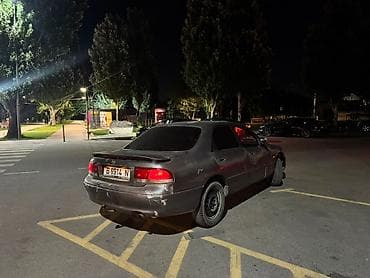 Транспорт: Mazda Cronos: 1993 г., 2 л, Механика — 2