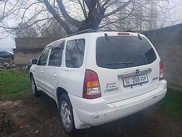е39 e39: Mazda Tribute: 2002 г., 2 л, Автомат, Газ, Кроссовер — 4