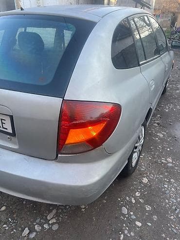 автомобиль тико: Kia Rio: 2005 г., Механика, Бензин, Хетчбек — 5
