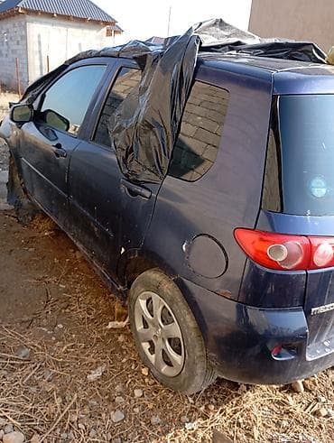 Продажа авто: Mazda Demio: 2006 г., Механика, Бензин, Хэтчбэк — 4