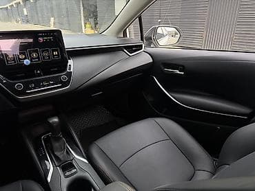 микра афтобус: Toyota Corolla: 2019 г., 1.8 л, Вариатор, Гибрид, Седан — 7