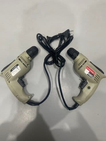 купить перфоратор недорого: Электрическая дрель "ИНТЕРСКОЛ" модели Д-350ЭР, выполненная в бежевом — 1