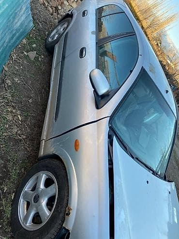 Унаа: Nissan Almera: 2001 г., Седан — 1