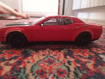 mini gt: Игрушечная модель автомобиля купе (масштаб примерно 1:18–1:24). - — 1