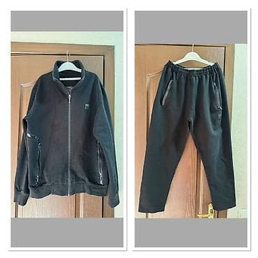 шорты спортивный: Спортивный костюм мужской, черный, из мягкого трикотажа. Состав — 4