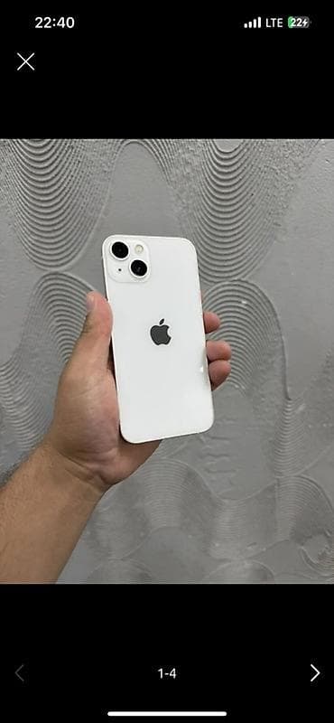 IPhone 13, белый цвет. Память 128 ГБ. На экране «Об этом устройстве»