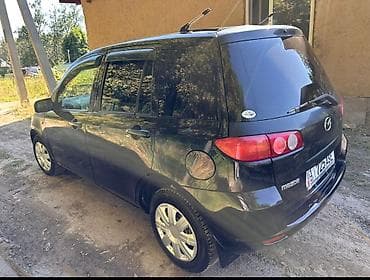 bcd com: Mazda Demio: 2003 г., 1.3 л, Автомат, Бензин, Универсал — 4
