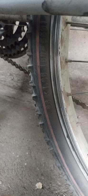 Велосипеддер: Горный велосипед с колесами 26" x 1.95 (50‑559). Особенности: - Рама — 4