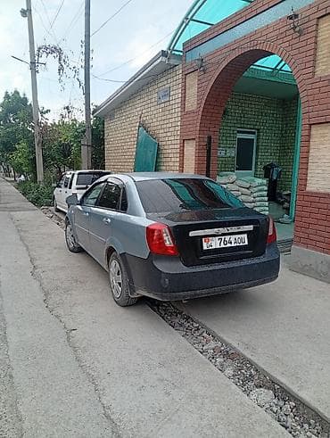 машина чанган фото цена: Легковой автомобиль седан, светло‑голубой цвет кузова. Передний — 2